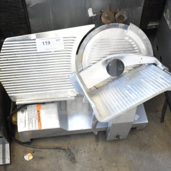 Fleetwood BF 300 meat slicer with blade sharpener, countertop model, 115V, 1-phase, commercial-grade, metal construction, includes warning label.