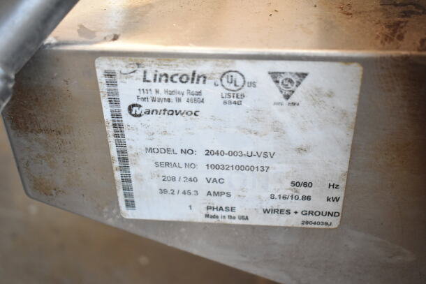 Lincoln Impinger 2040-003-U-VSV label showing model, 208/240V, 1 phase, serial number 1003210000137.