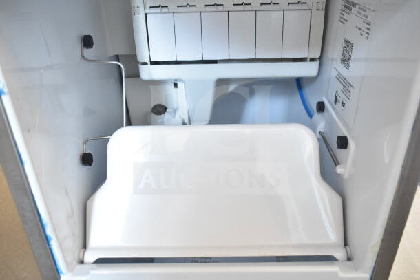 BRAND NEW 2024 Hoshizaki AM-50BAJ-DS Top Hat Cuber Icemaker. 115 Volts, 1 Phase, interior view showing ice-making compartment.