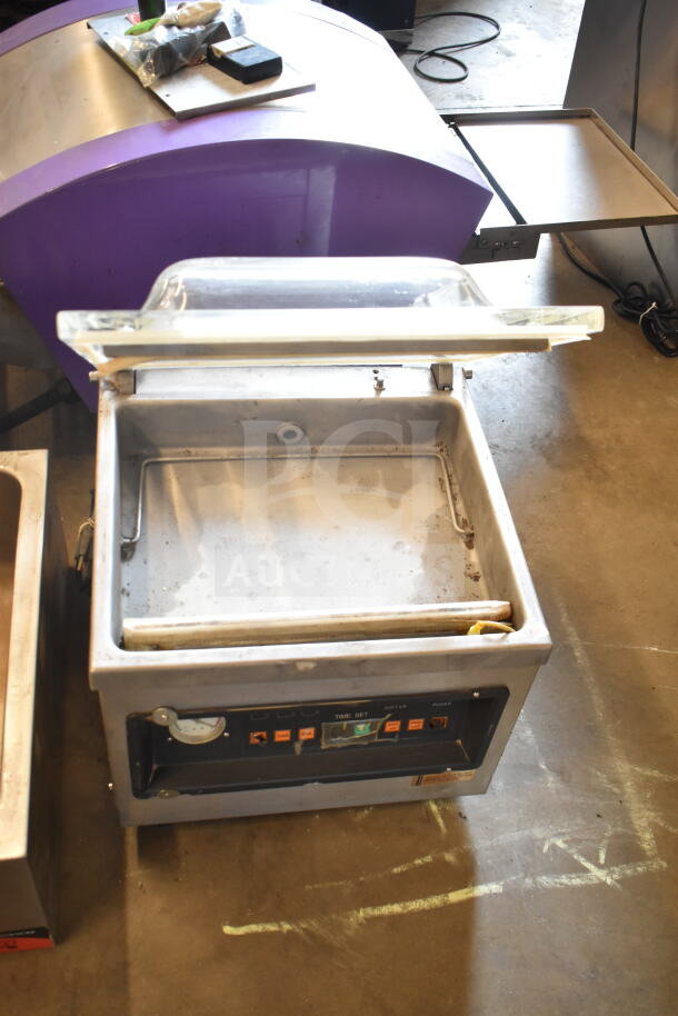 Kingpak KVP 400 Commercial Vacuum Sealer on countertop, open lid. Control panel visible. 110 Volts, 1 Phase power.