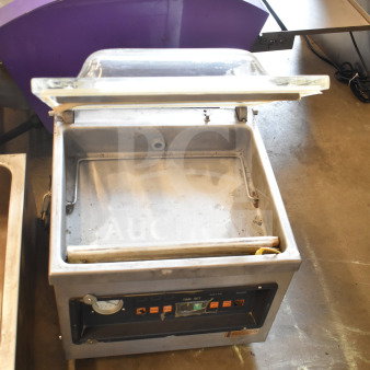 Kingpak KVP 400 Commercial Vacuum Sealer on countertop, open lid. Control panel visible. 110 Volts, 1 Phase power.
