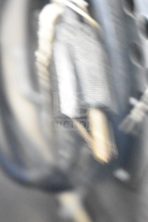 Blurry image, unable to provide a clear description of the item features or details.