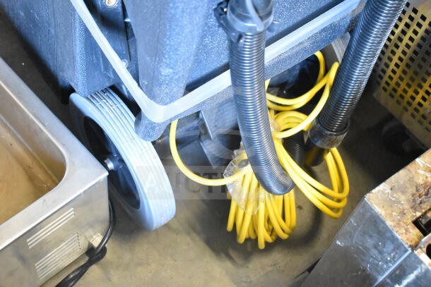 Viper Shovelnose 18 Gallon Wet/Dry Vacuum, new condition, featuring large wheels, yellow cord, and hose; includes squeegee and tool kit.