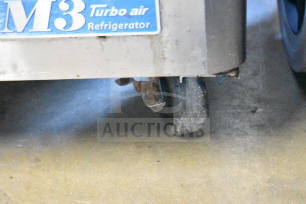 Turbo Air MST-72-30 Sandwich Prep Table, visible caster wheel, labeled Turbo Air Refrigerator, commercial use.