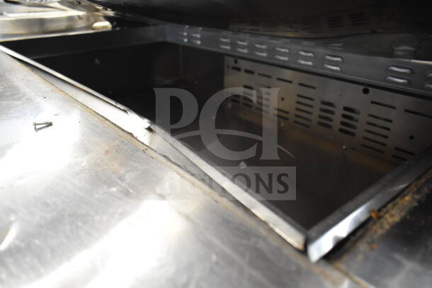 Turbo Air MST-72-30 commercial sandwich salad prep table, showing interior metal condition. 115 volts, 1 phase.