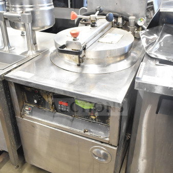 BKI FKM-F commercial electric pressure fryer in stainless steel, 208 volts, 3-phase, floor style, visibly used condition.