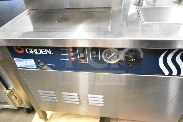 Groen commercial two-deck steam cabinet with dual TDC/3-20 5-gallon manual tilt steam kettles; features control panel with gauges.
