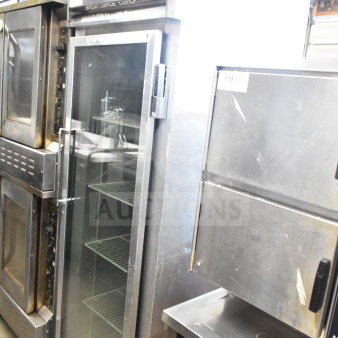 Continental 1RNGD single door reach-in cooler, 2019 model, with glass door, shelves, and commercial casters. 115V, 1 phase.