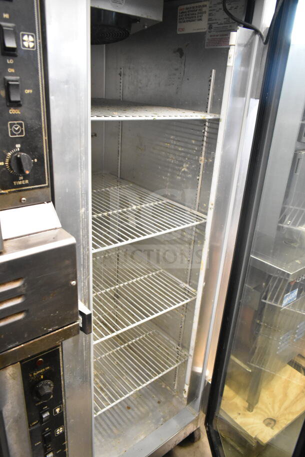 2019 Continental 1RNGD commercial cooler, single door, on casters, 115V, 1 phase, stainless steel interior, visible wear.