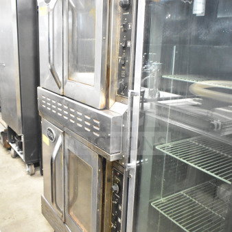 Royal commercial full-size convection ovens with view-through and solid doors, thermostatic controls, dual units.