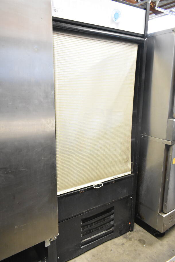 Structural Concepts Oasis B32EW merchandiser, 120 Volts, 1 Phase. Features a roll-down cover, black exterior, commercial use.
