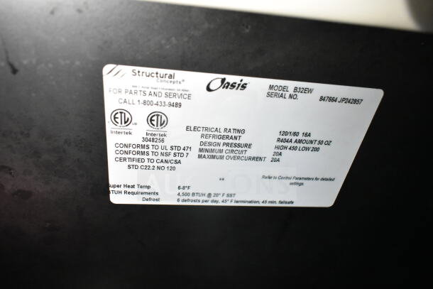 Structural Concepts Oasis B32EW label showing model, serial number, electrical rating, and certifications for grab n go merchandiser.
