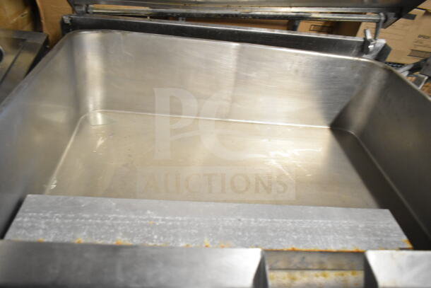 TS-37G Commercial Manual Tilting Braising Skillet in stainless steel, floor model. Visible used condition, clean interior.