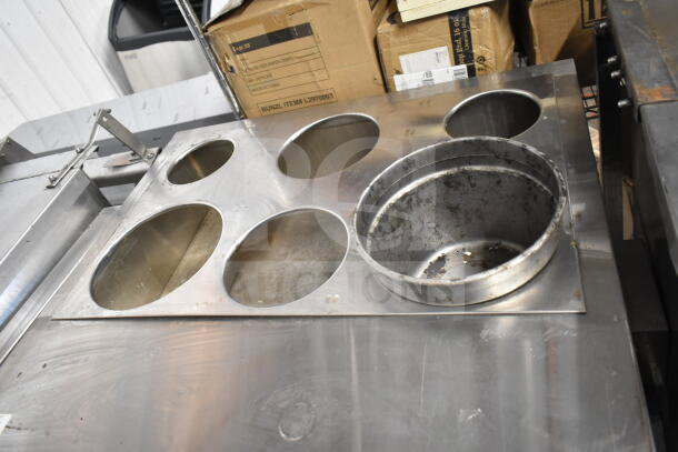 L&T SLT commercial steam table, natural gas powered, with multiple round slots, stainless steel, used condition.