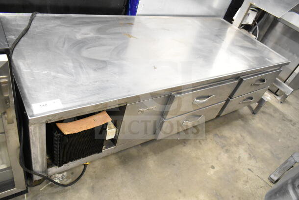 Traulsen Commercial 4 Drawer Chef Base, stainless steel, 115 volts, 1 phase, shows signs of use, label visible.