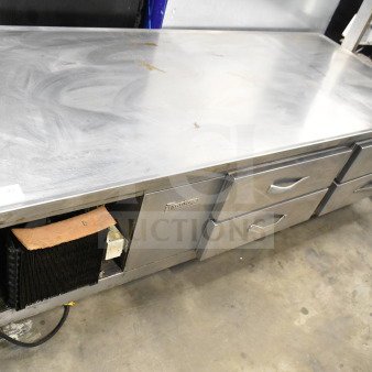 Traulsen Commercial 4 Drawer Chef Base, stainless steel, 115 volts, 1 phase, shows signs of use, label visible.