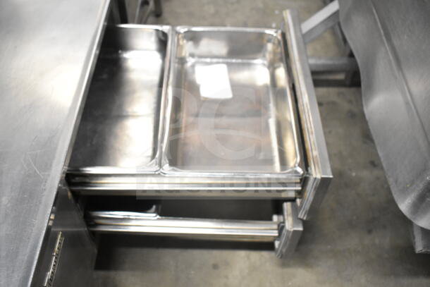 Traulsen Commercial 4 Drawer Chef Base, stainless steel, 115V, 1 Phase, open drawers showing interior condition.