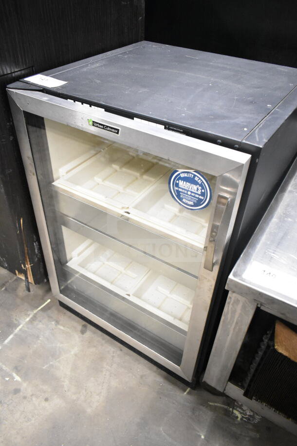 Urban Cultivator Mini Cooler Merchandiser, 115V, 1 Phase. Features stainless steel frame, glass door, two shelves.