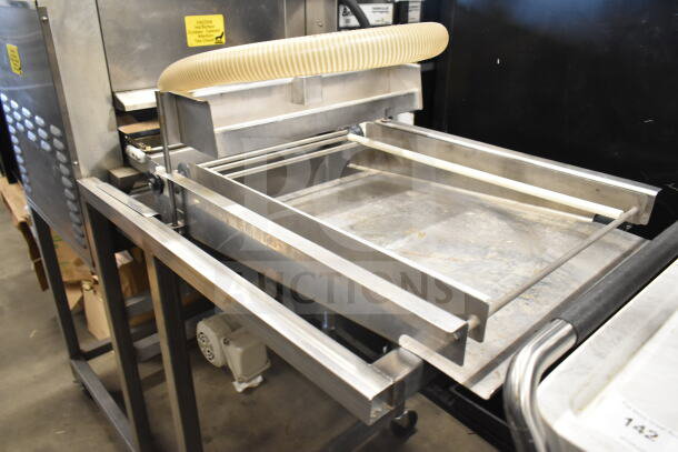 Belshaw TG50 Thermoglazing Station, commercial casters, stainless steel, 208V, 1 phase, visible caution labels, used.
