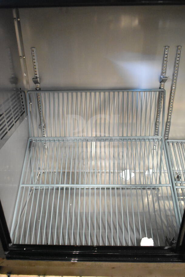 Brand new Avantco 178UBB60SHC 60" black bar fridge, narrow sliding glass doors, LED lighting, scratch and dent condition.