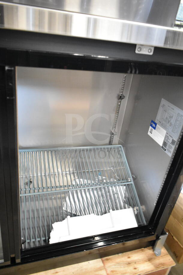 BRAND NEW 2025 Avantco 178UBB60SHC 60" black bar fridge, sliding glass door, LED lighting, slight dent visible, 115V.