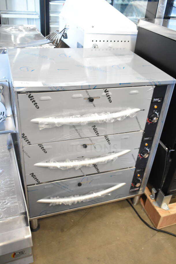 Brand new ServIt 423WDSFS3 Triple Drawer Warmer, 120V, 1 Phase. Features stainless steel build, protective wrap, minor scratches and dents.