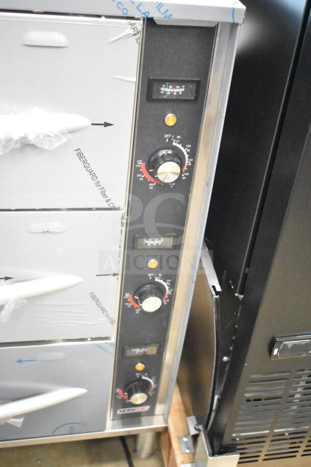 Brand new ServIt 423WDSFS3 triple freestanding drawer warmer, 120V, 1 phase, with controls, slight scratches.