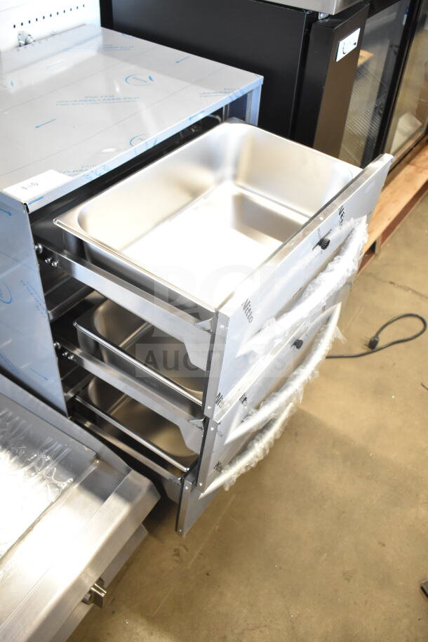 Brand new ServIt 423WDSFS3 triple freestanding drawer warmer, 120V, 1 phase, with visible scratches and dents.