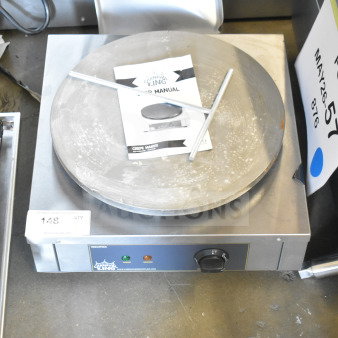 Brand new Carnival King 382CM16A 16" crepe maker, 2023 model, 120 volts, visible user manual, scratch and dent condition.