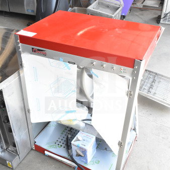 Brand new Paragon TP-16 popcorn machine, 16 oz, 120V, scratch and dent, Classic Pop model, red top, label visible.