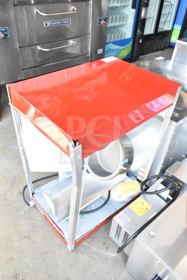 Brand new Paragon TP-16 popcorn machine, scratch and dent, 16 oz capacity, red top, 120V, 1 phase unit, visible wiring.