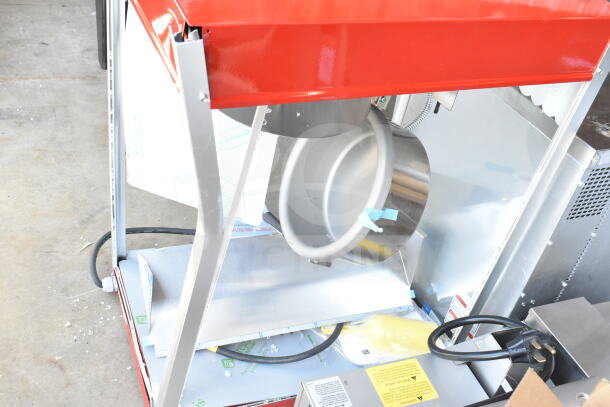 Brand new Paragon TP-16 Popcorn Machine, 16 oz, 120V, slight scratch and dent, shown with red top and interior parts.