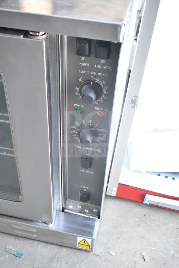 MainStreet 541FEC1C single deck electric convection oven with controls, 208 volts, 3/1 phase, new with minor dents.