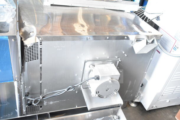 Brand new scratch and dent MainStreet 541FEC1C convection oven, 208V, 3/1 phase, "Caution Hot" label, metal exterior.