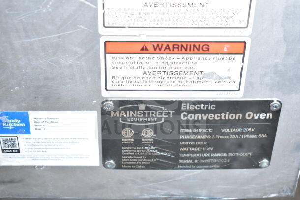 "MainStreet 541FEC1C electric convection oven label showing warnings, voltage 208V, 3/1 phase, and installation instructions."