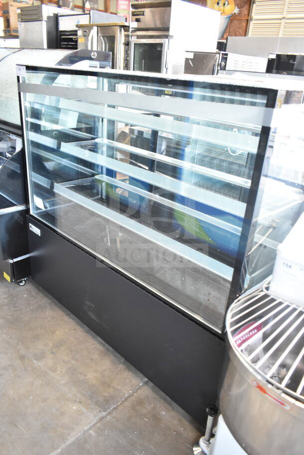 Brand new Avantco 193BCF60B refrigerated bakery display case. Black, 59 1/8", with broken glass panel shown. 110-120V, 1 phase.