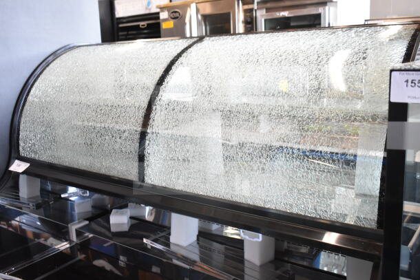 Brand new Avantco 193CAC60B refrigerated merchandiser, 59 1/8" black curved dual service, with broken glass visible.