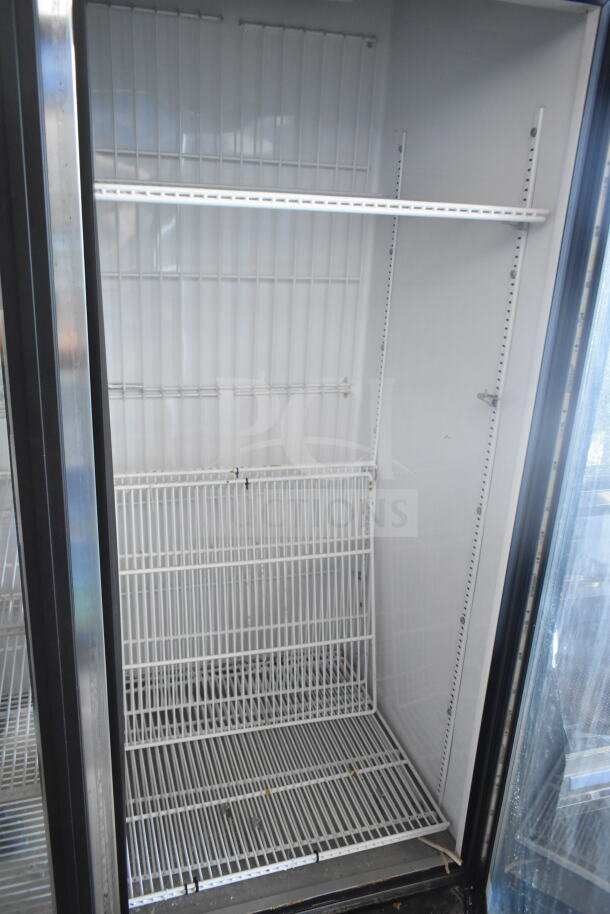 True GDM-72F-LD Commercial 3 Door Freezer Merchandiser, white interior, adjustable shelves, 115/208-240V, 1 Phase.