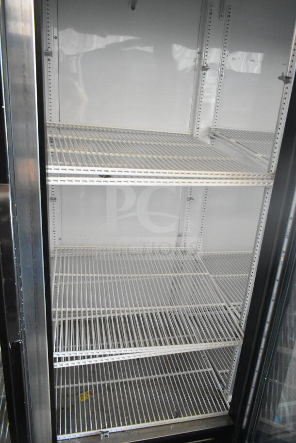 2016 True GDM-72-LD 3 Door Reach-In Cooler, commercial use, white interior, 115 volts, 1 phase, clean condition.