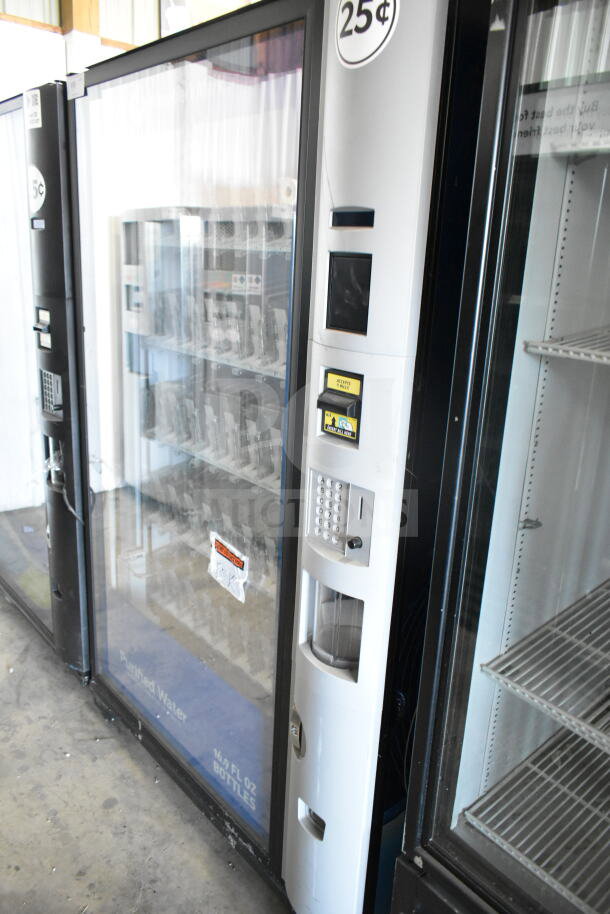 Crane 5800-4 commercial drink vending machine with bill acceptor, 115 volts, 1 phase, used, shows pricing labels.