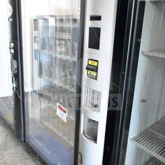 Crane 5800-4 commercial drink vending machine with bill acceptor, 115 volts, 1 phase, used, shows pricing labels.