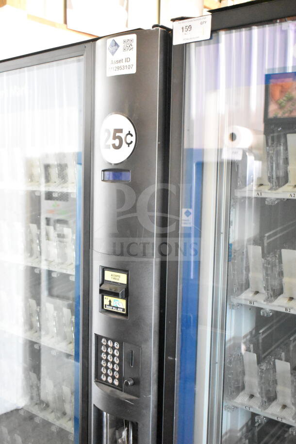 Crane 5800-4 vending machine with bill acceptor, 25-cent label, Asset ID tag, 115 volts, 1 phase, used condition.