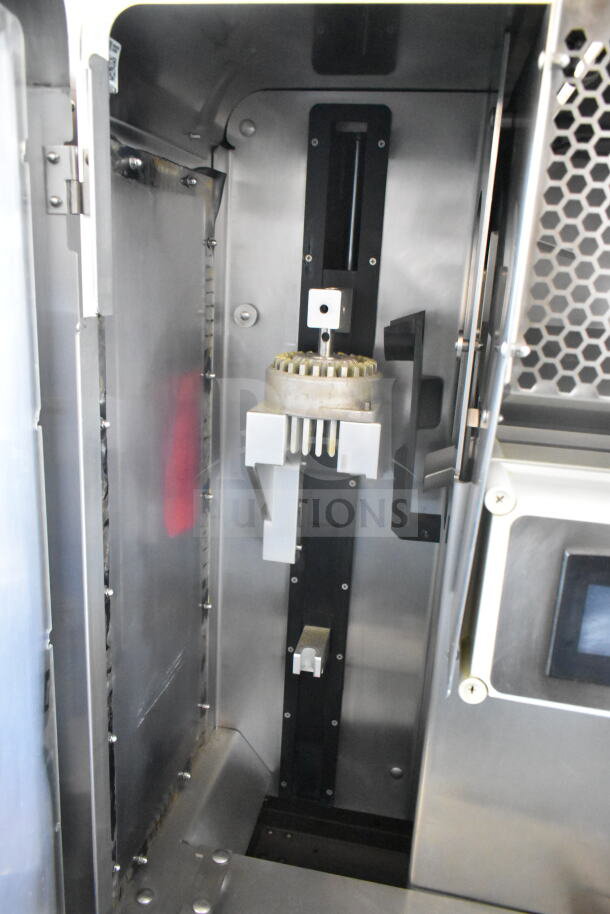 JBT 2ND-GEN-MFJ Fresh N Squeeze citrus juicer, floor style, commercial casters, 115V, 1 Phase, interior view showing mechanism.