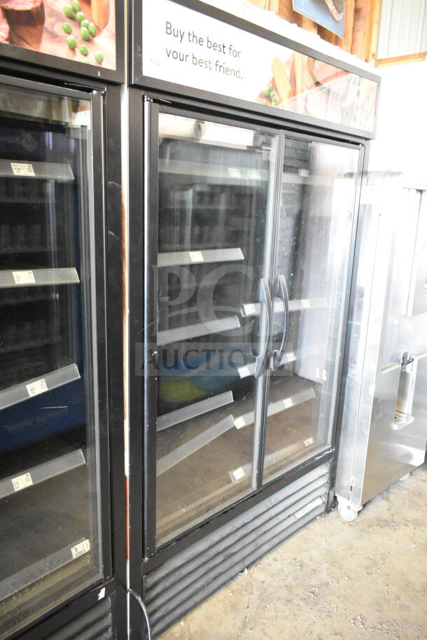 2021 True TVM-48SL-HC commercial two-door cooler merchandiser, black finish, glass doors, 115 Volts, 1 Phase.