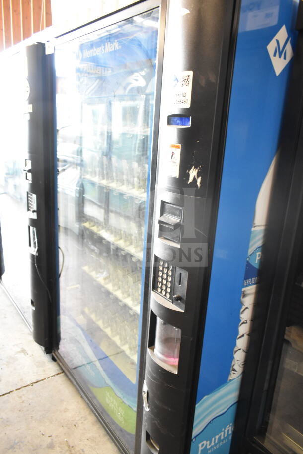 Crane 5800-4 commercial vending machine, includes bill acceptor. Visible signs of use, 115 volts, 1 phase, asset ID shown.
