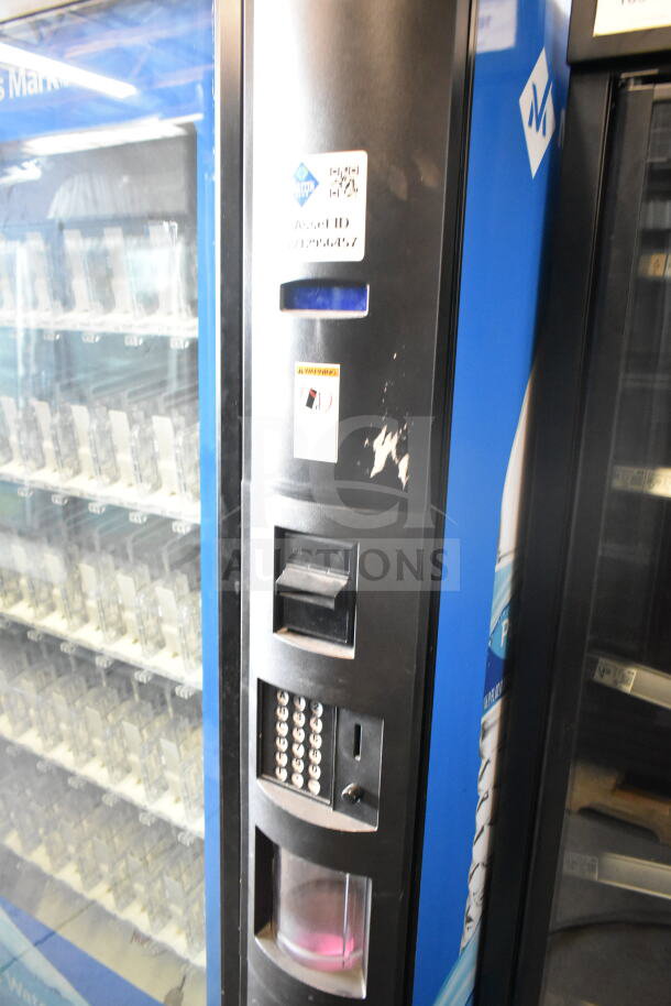 Crane 5800-4 commercial vending machine with bill acceptor, 115V, 1 Phase. Features bottled drink display and keypad. Some wear visible.