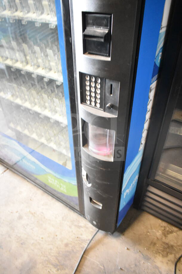 Crane 5800-4 vending machine with bill acceptor, 115 volts, 1 phase. Visible keypad, drink selection area. Good condition.