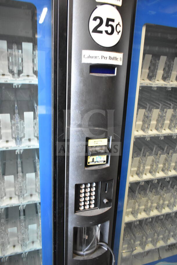 Crane 5800-4 vending machine, features bill acceptor, commercial model, 115V, minor wear, displays 25¢ per bottle pricing.
