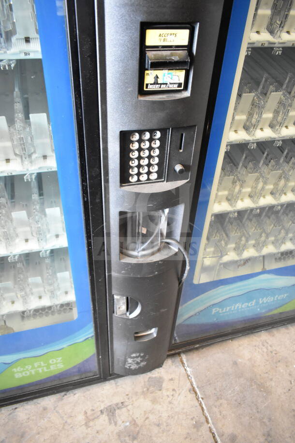 Crane 5800-4 commercial vending machine with bill acceptor. Displays keypad and bottle section. 115V, 1 phase.