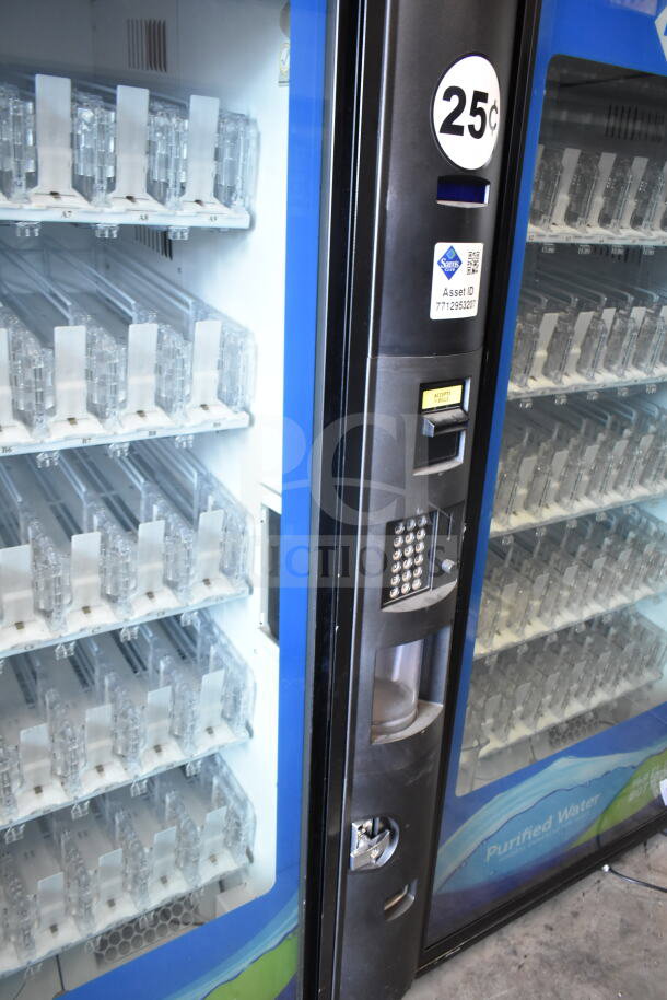 Crane 5800-4 commercial drink vending machine with bill acceptor, 115V, 1 phase. Includes 25¢ pricing label and asset ID tag.